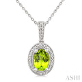 7X5 MM Oval Shape Peridot and 1/50 Ctw Round Cut Diamond Semi-Precious Pendant With Chain in Sterling Silver