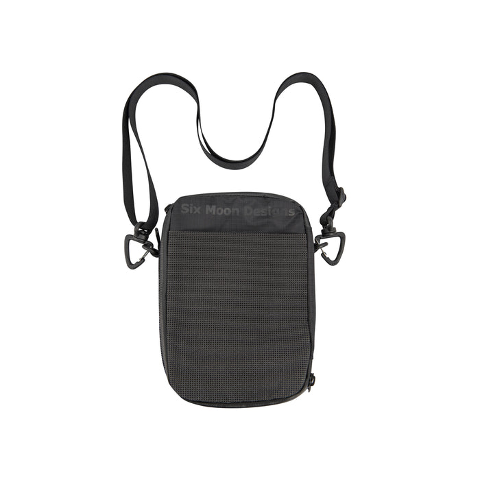 Back of Black crossbody Passport Pouch with a strap on a white background