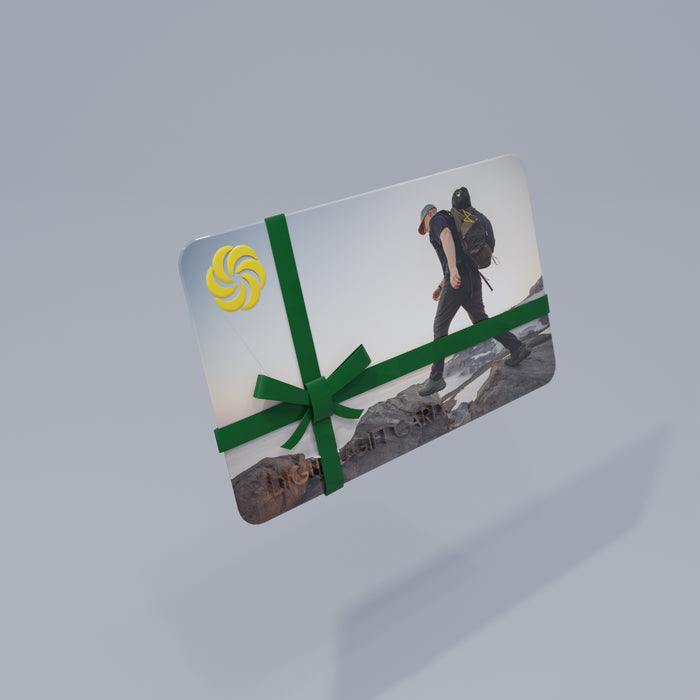 Gift card with a green ribbon on a gray background