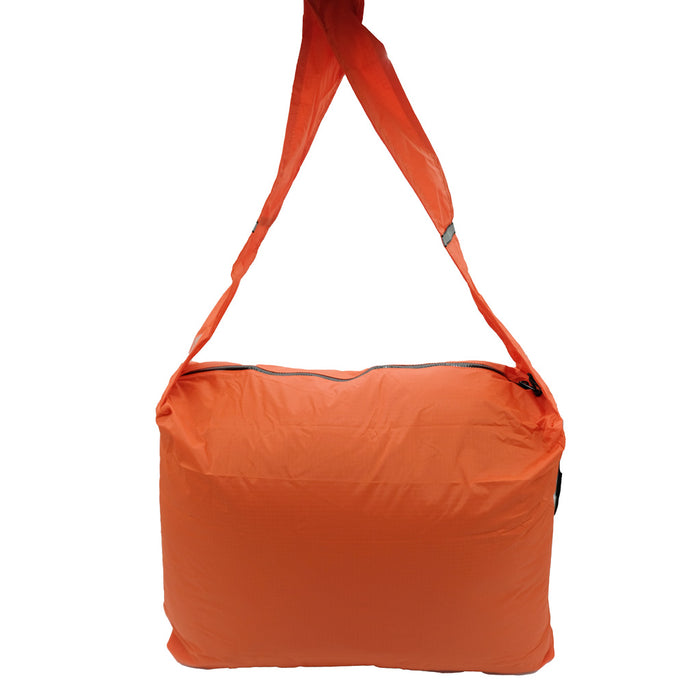 Orange Grocery Go Getter stuffed up and showing the long strap.