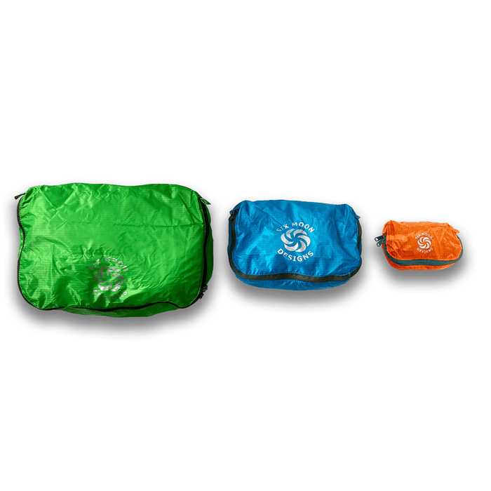 Mult size packing pods showing a Green Large, Blue Medium and Orange Small