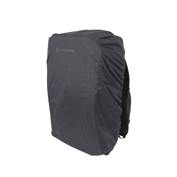 Black Shower Cap on a backpack with a visible Six Moon Designs logo on a white background facing 3/4 to the side.